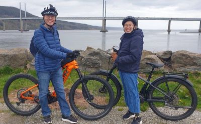 Joshua Tan Cycling on the  tour with redspokes