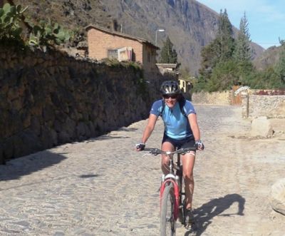 Christine Jackson  Cycling on the  tour with redspokes