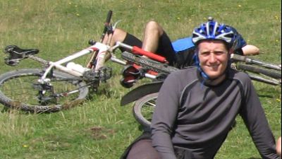 Doug Pether Cycling on the  tour with redspokes