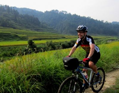John Beckley Cycling on the  tour with redspokes
