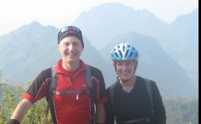Jean Mc Arthur and Andrew Credland Cycling on the  tour with redspokes