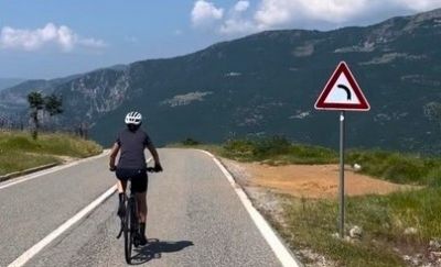 Janet Young Cycling on the  tour with redspokes