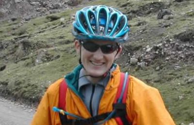 Damian King Cycling on the  tour with redspokes