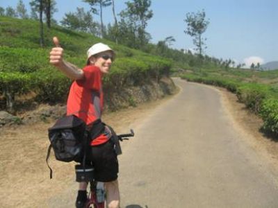 Chris Ellerton Cycling on the  tour with redspokes