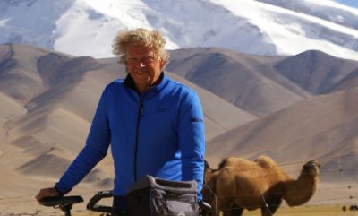 Nick Tompsett Cycling on the  tour with redspokes