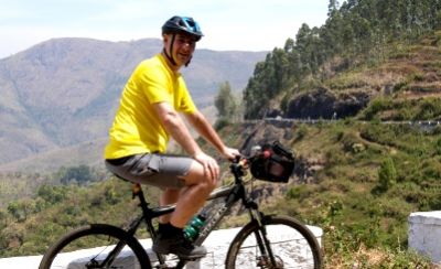 Ian Smith Cycling on the  tour with redspokes