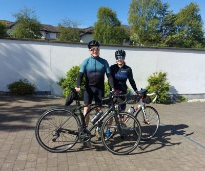 Lisa and Eric McQuarrie Cycling on the  tour with redspokes