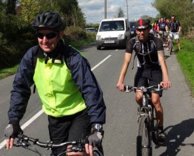 Gary Maynard Cycling on the  tour with redspokes