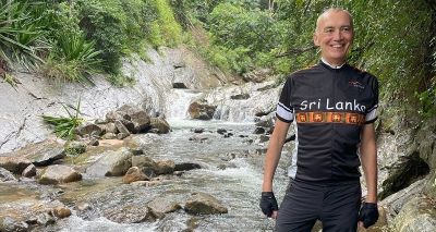 John Homer Cycling on the  tour with redspokes