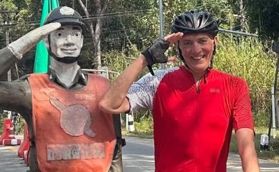 John Homer Cycling on the  tour with redspokes