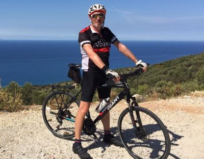 Kevin Thomasson Cycling on the  tour with redspokes