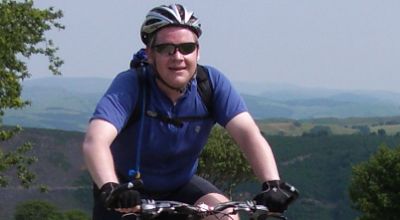 Richard Atkin Cycling on the  tour with redspokes
