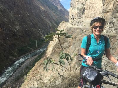 Alison Blattman Cycling on the  tour with redspokes