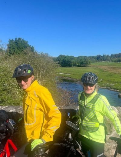 Alan and Elspeth Cycling on the  tour with redspokes